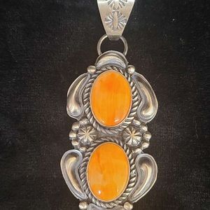 Navajo handmade silver spiny oyster pendant